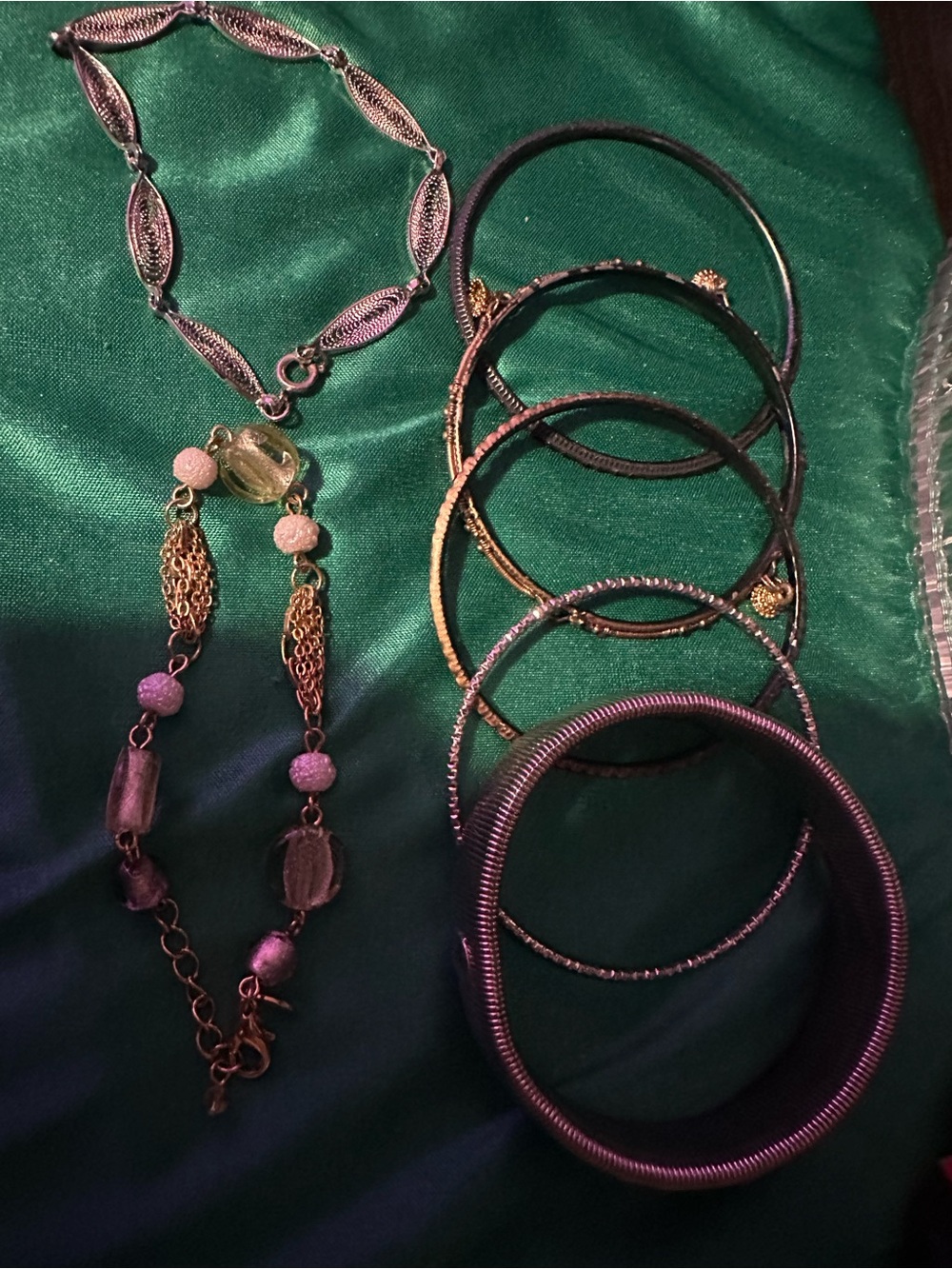 7 random bangles and bracelets. Unsigned.